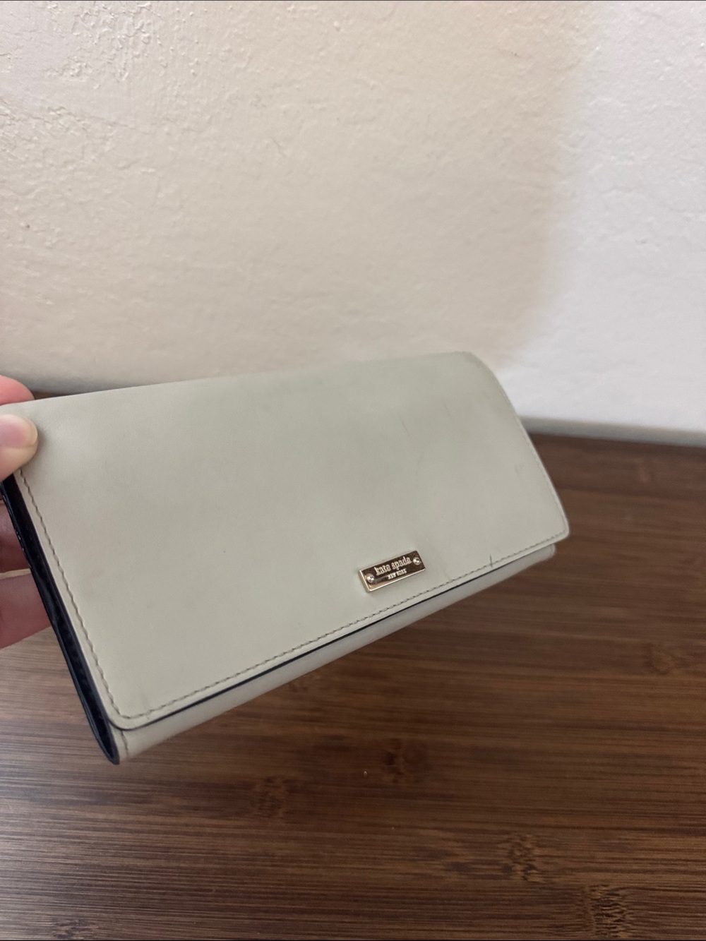 kate spade cream leather continental wallet with gold plaque
